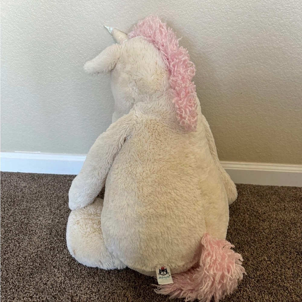 Large soft giant unicorn 2015 jellycat brand stuffed animal. Discontinued